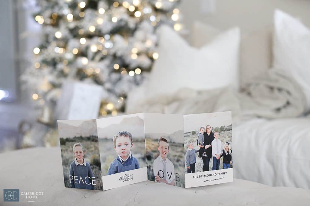 Christmas Card on bench with Christmas tree lights on